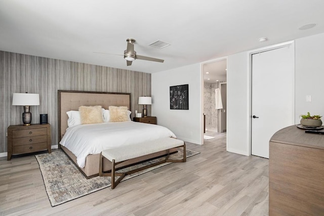 bedroom with ceiling fan and light hardwood / wood-style flooring