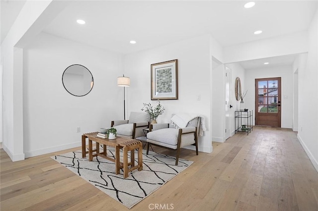 sitting room featuring light wood-type flooring