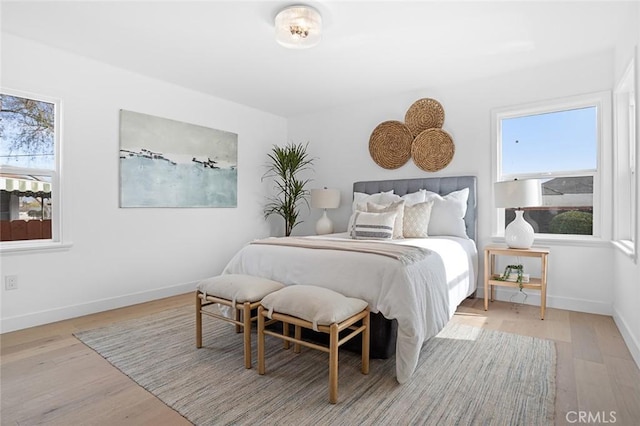 bedroom with light hardwood / wood-style floors