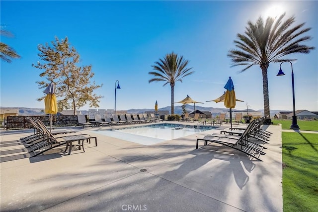 pool featuring a patio area