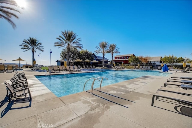 pool with a patio