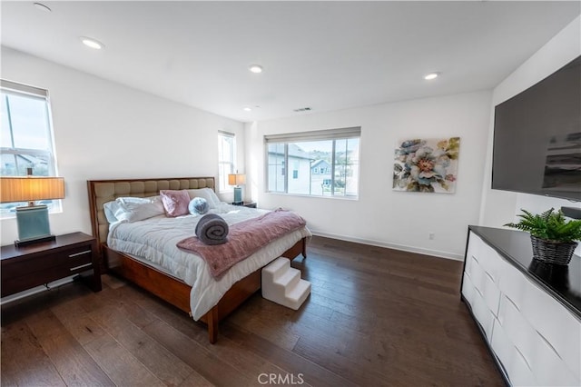 bedroom featuring dark wood-type flooring