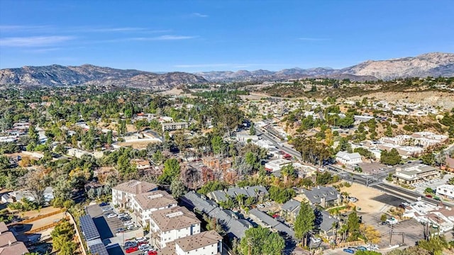 drone / aerial view featuring a mountain view