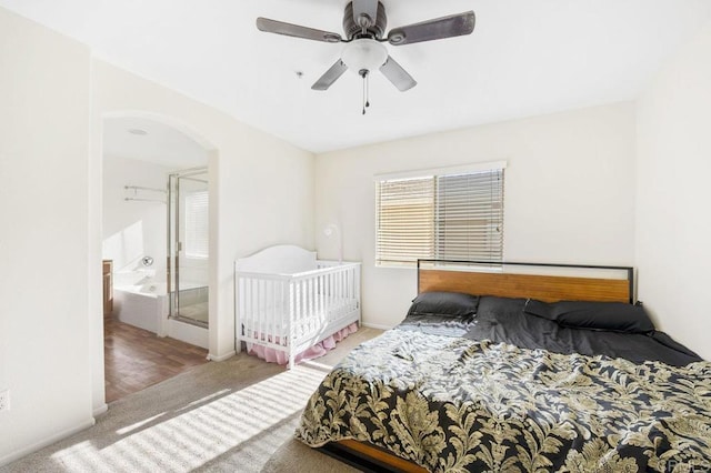 bedroom with ceiling fan and carpet