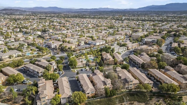 drone / aerial view featuring a mountain view