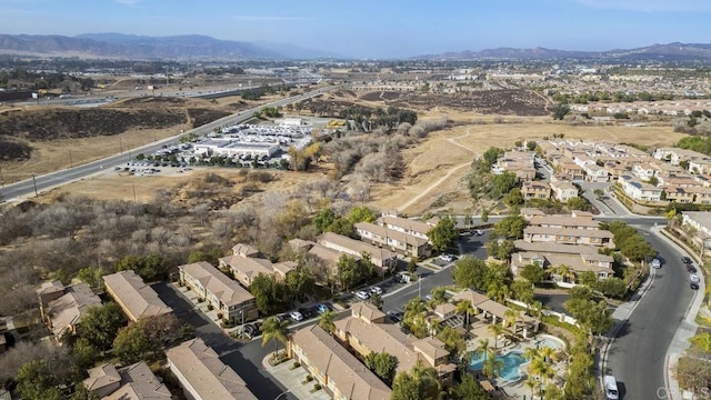 drone / aerial view featuring a mountain view