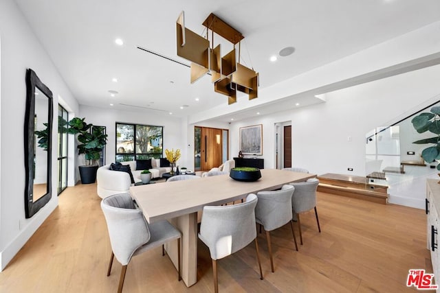 dining area with light wood-type flooring