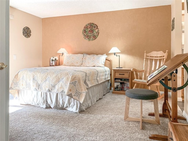 bedroom featuring light carpet