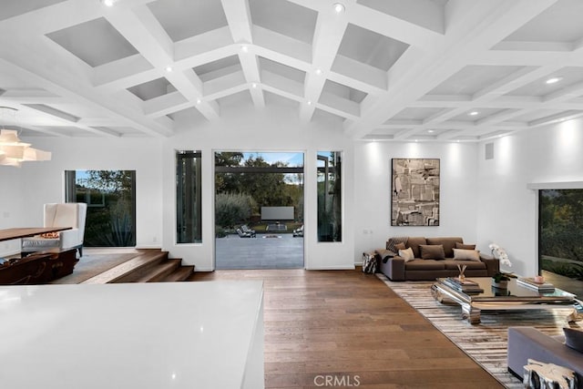 living room with beam ceiling and hardwood / wood-style floors