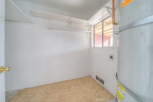 laundry area with electric dryer hookup