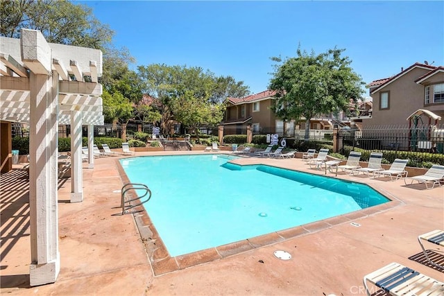 view of swimming pool featuring a patio area