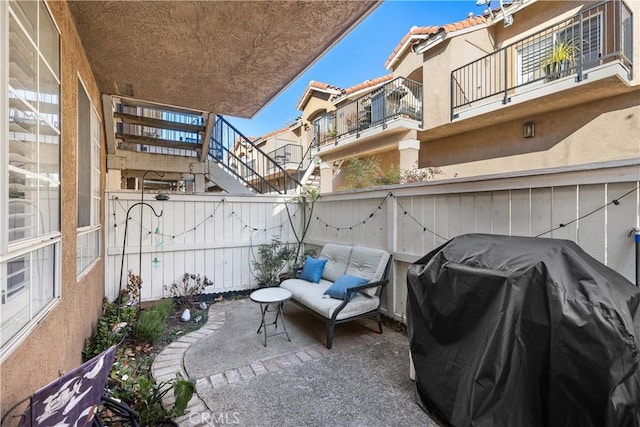 view of patio with a grill