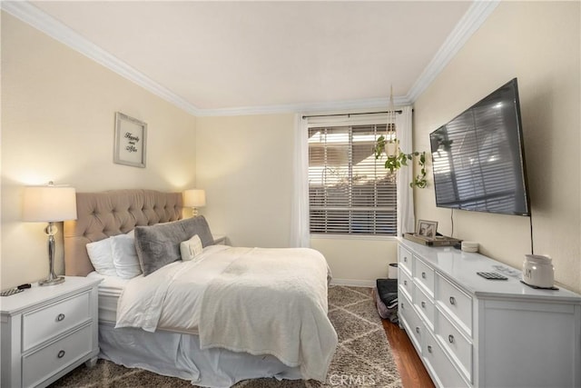 bedroom with crown molding and dark wood-type flooring