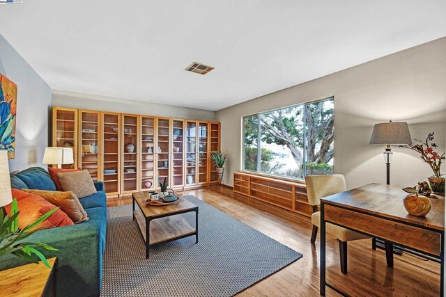 living room with wood-type flooring