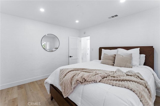 bedroom featuring light wood-type flooring