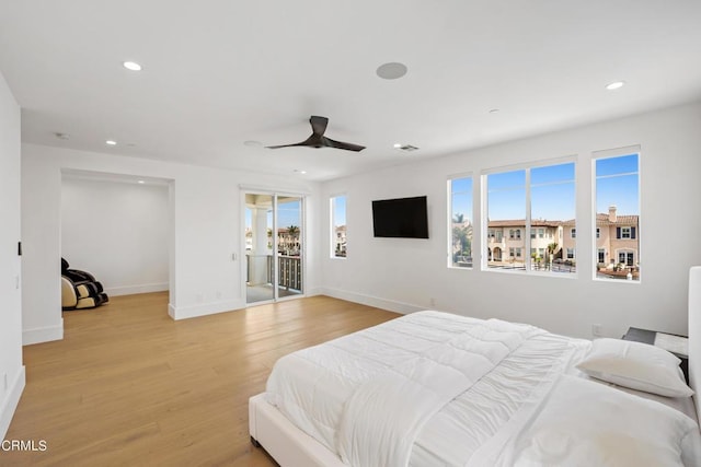 bedroom with ceiling fan, light hardwood / wood-style floors, and access to outside