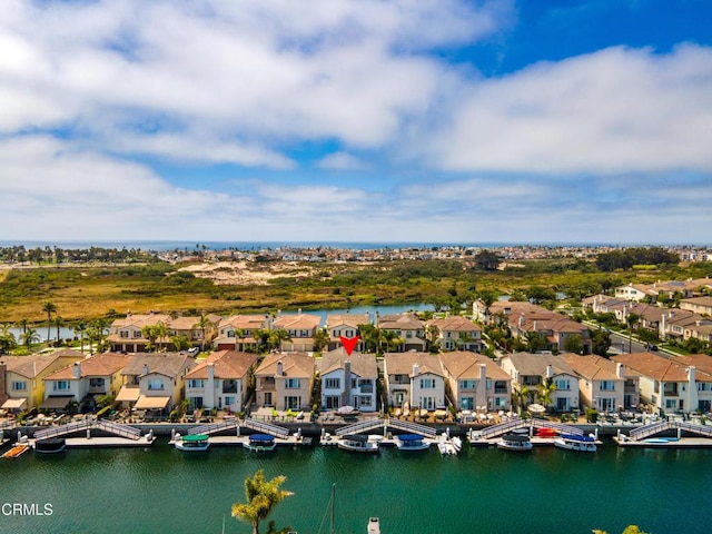 bird's eye view with a water view