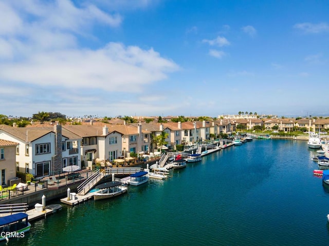 property view of water featuring a boat dock