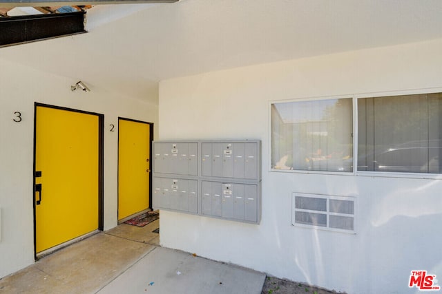 interior space featuring a mail area