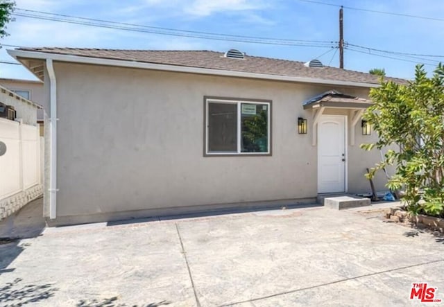 view of front of property with a patio area