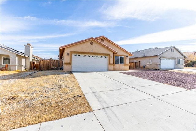 single story home with a garage