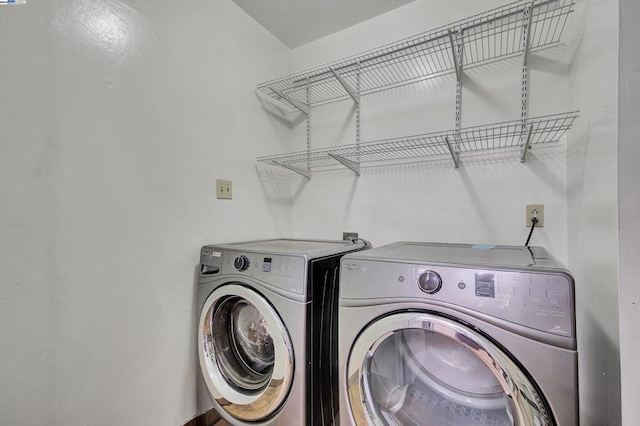 laundry area featuring independent washer and dryer