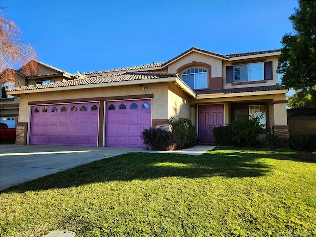 view of front of property with a garage and a front lawn