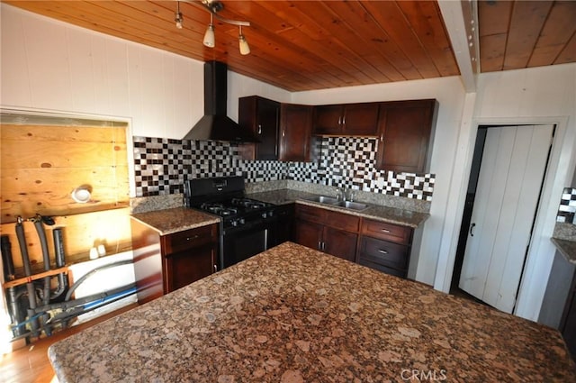 kitchen featuring wood ceiling, sink, black range with gas stovetop, and exhaust hood