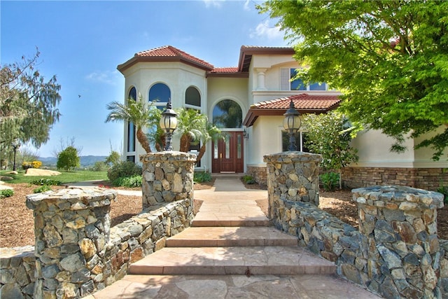 view of mediterranean / spanish house