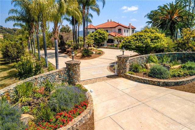 surrounding community featuring a gate and fence