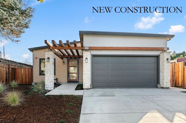 view of front of property with a garage