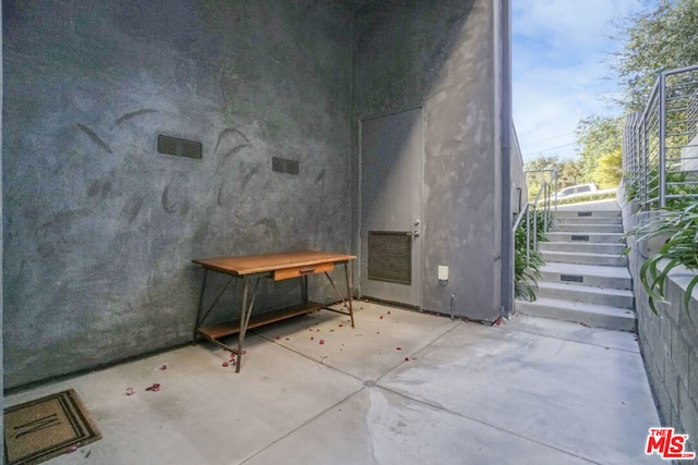 miscellaneous room featuring concrete floors