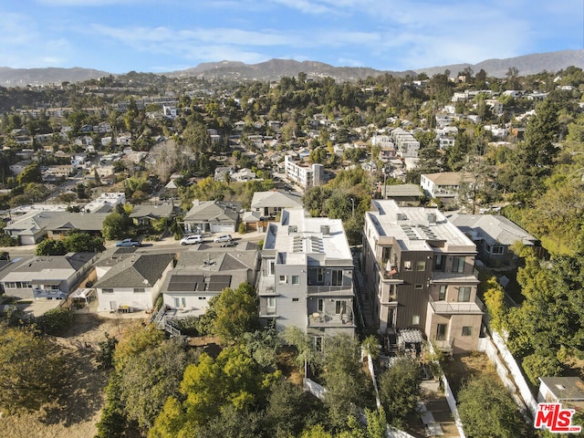 drone / aerial view featuring a mountain view