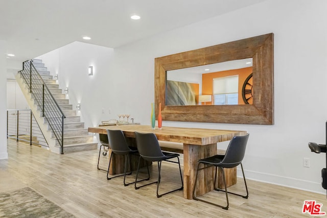 dining room featuring light hardwood / wood-style floors