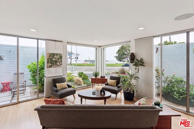 sunroom featuring baseboard heating