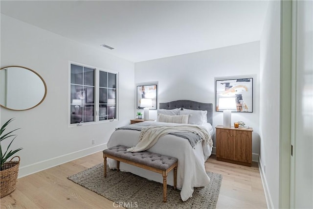 bedroom featuring light hardwood / wood-style floors