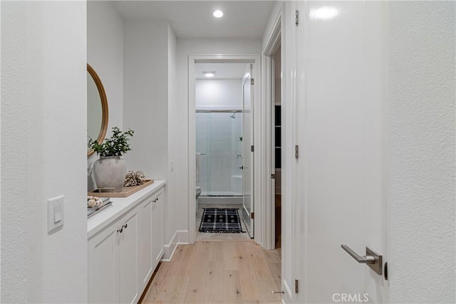 corridor featuring light hardwood / wood-style flooring