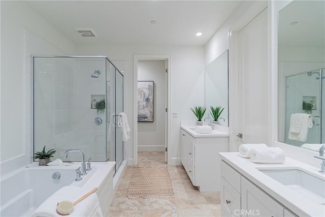 bathroom with independent shower and bath, tile patterned floors, and vanity