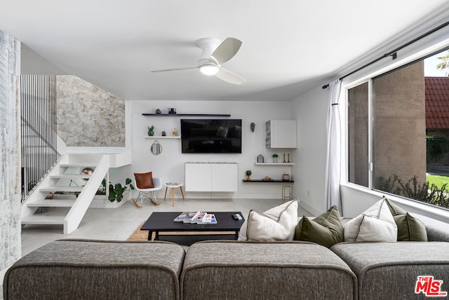 living room featuring ceiling fan