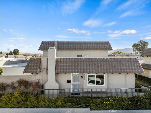 exterior space featuring a mountain view