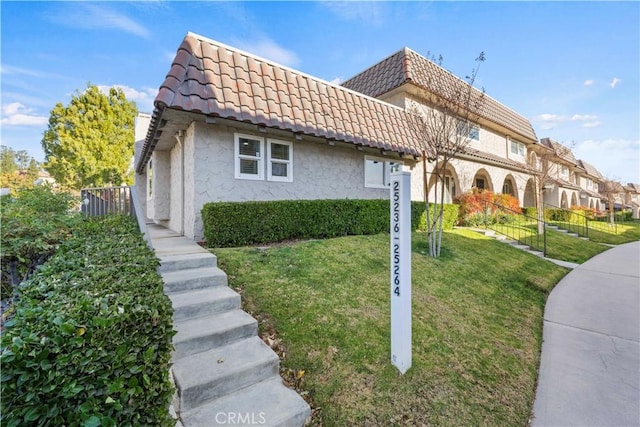 exterior space featuring a lawn