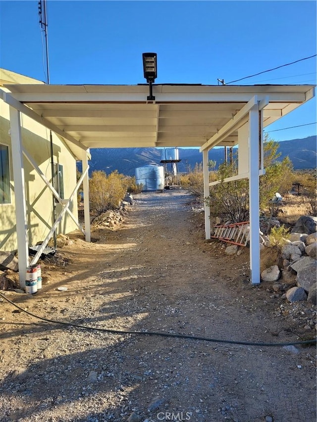 view of car parking featuring a carport