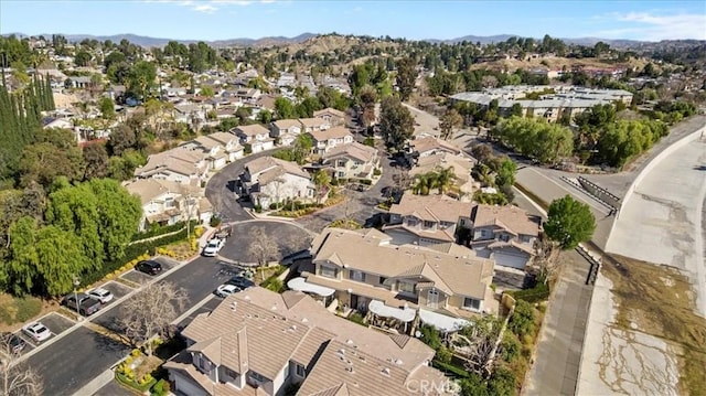 birds eye view of property with a residential view