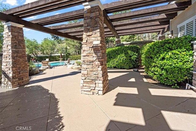 view of patio featuring an outdoor pool and a pergola