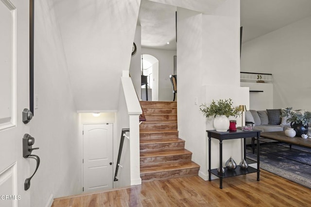 staircase featuring hardwood / wood-style floors