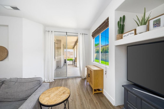 interior space with hardwood / wood-style flooring