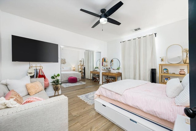 bedroom featuring ceiling fan and light wood-type flooring