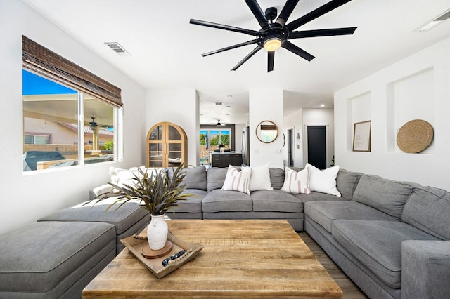 living room featuring ceiling fan