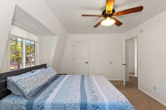 carpeted bedroom with ceiling fan