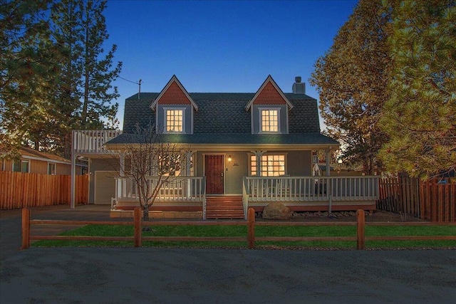 view of front of property featuring a wooden deck